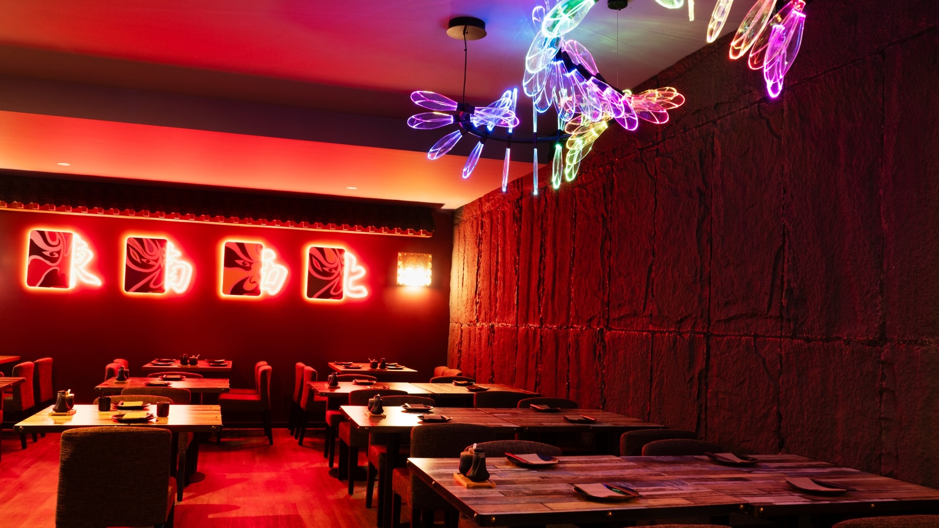 restaurant with red neon lights.